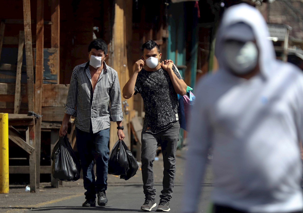 Esta multa y sanciones recibirían los hondureños que no usen mascarillas