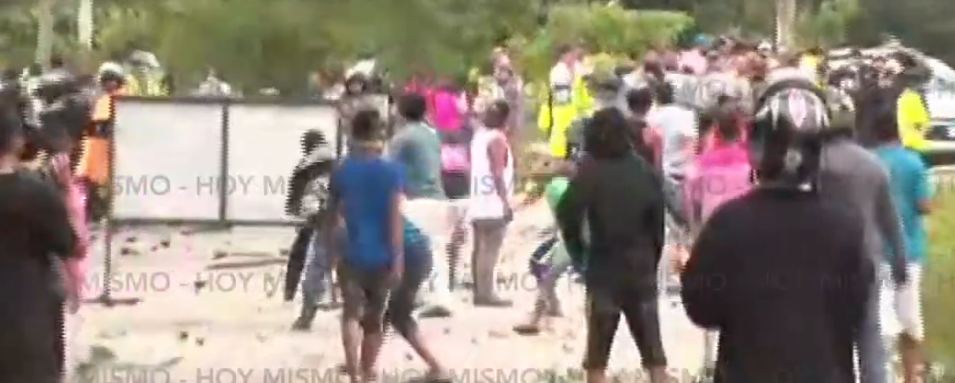 Con machete en mano, lavadores de carros se oponen a desalojo en San Pedro Sula
