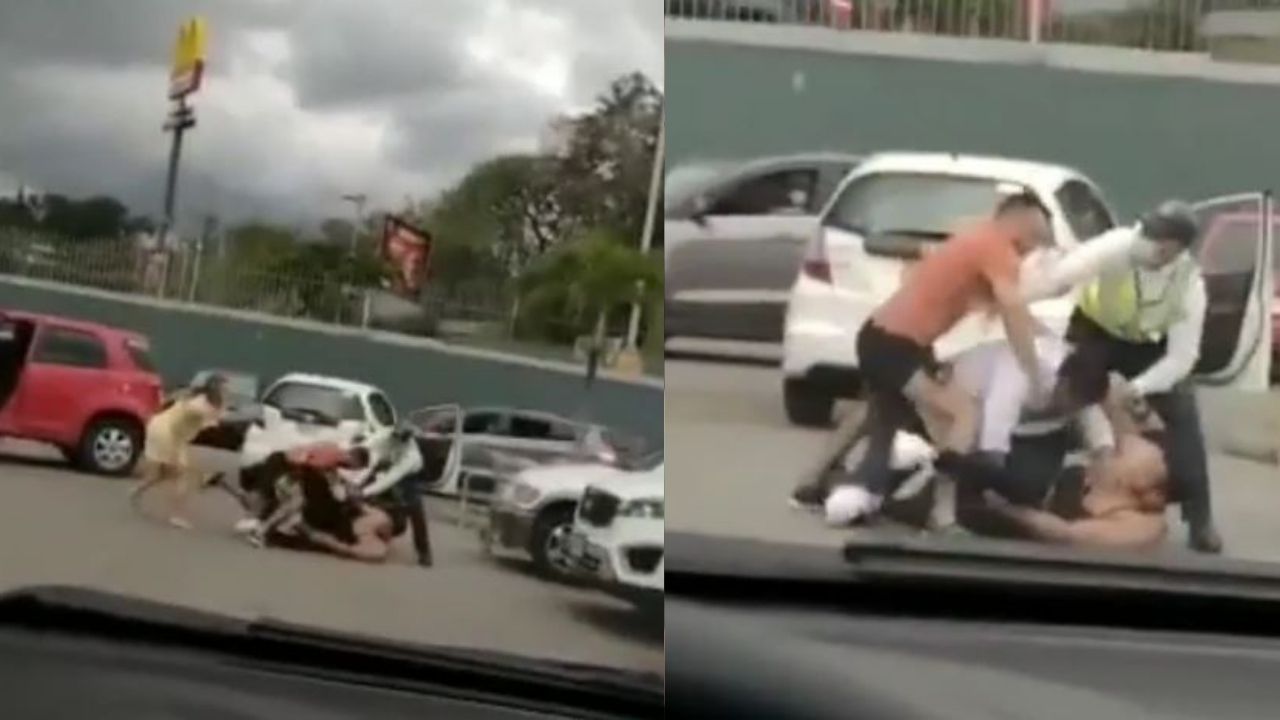 Captan a dos hondureños golpeando a otro en estacionamiento en Tegucigalpa