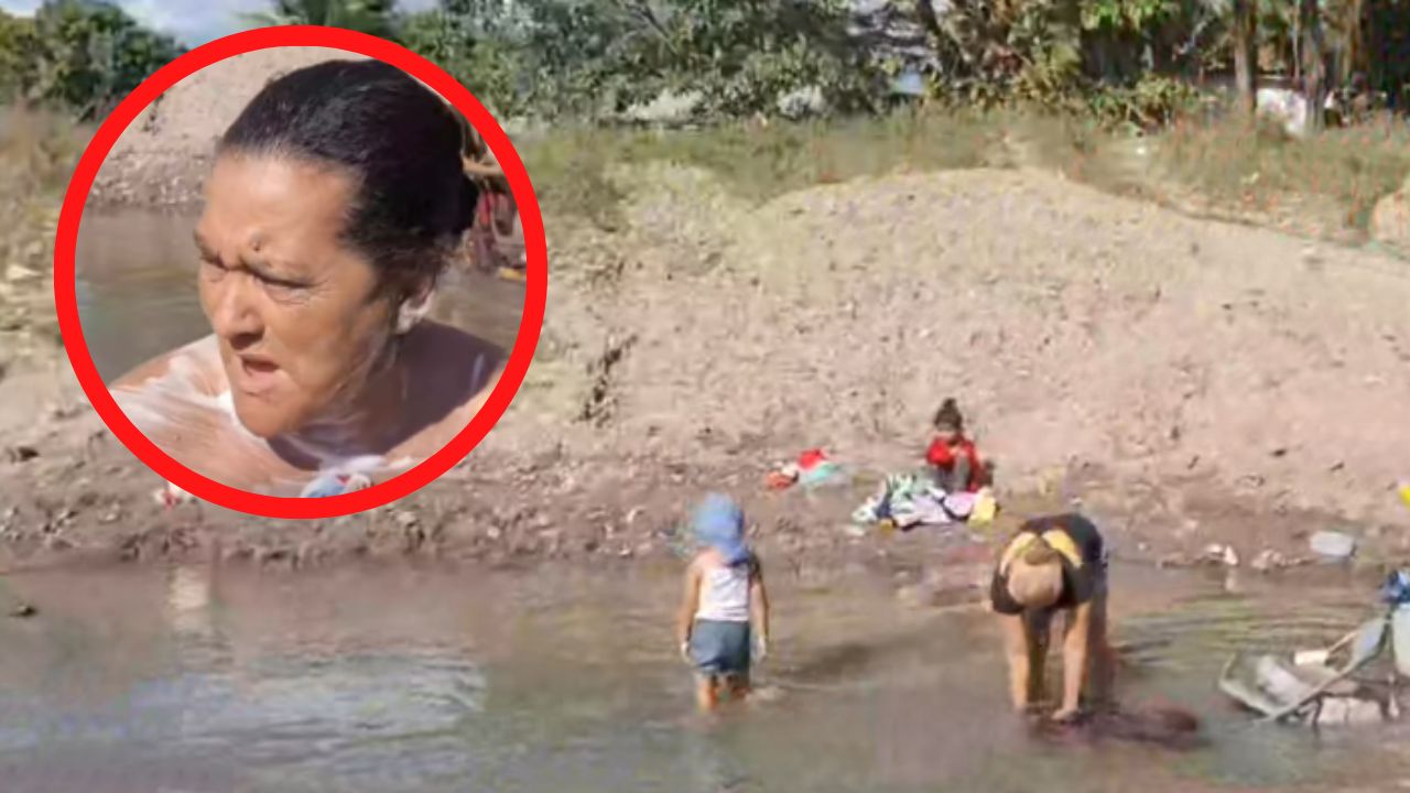 Imagen de Vídeo: Por falta de agua, mujer se baña en río 'contaminado' de Juticalpa, Olancho