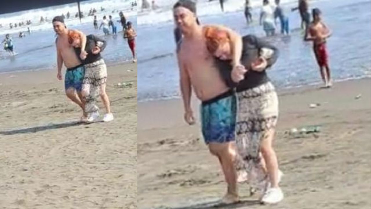 Indigna en redes vídeo de hombre agrediendo a su pareja en la playa