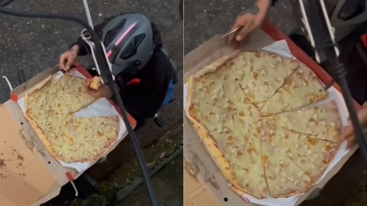 VIDEO: Descubren a repartidor comiéndose un pedazo de la pizza que debía entregar