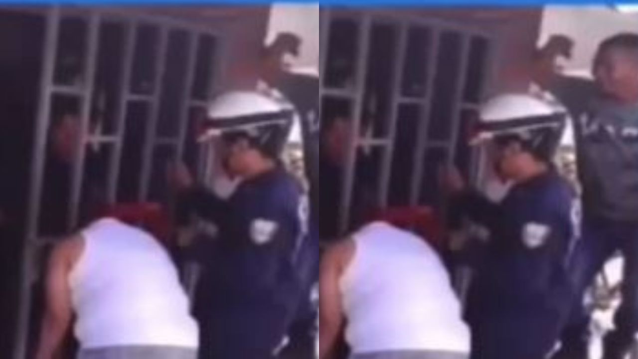 VIDEO: Mujer resultó con su cabeza atorada en barrotes de portón por escuchar pleito de vecinos