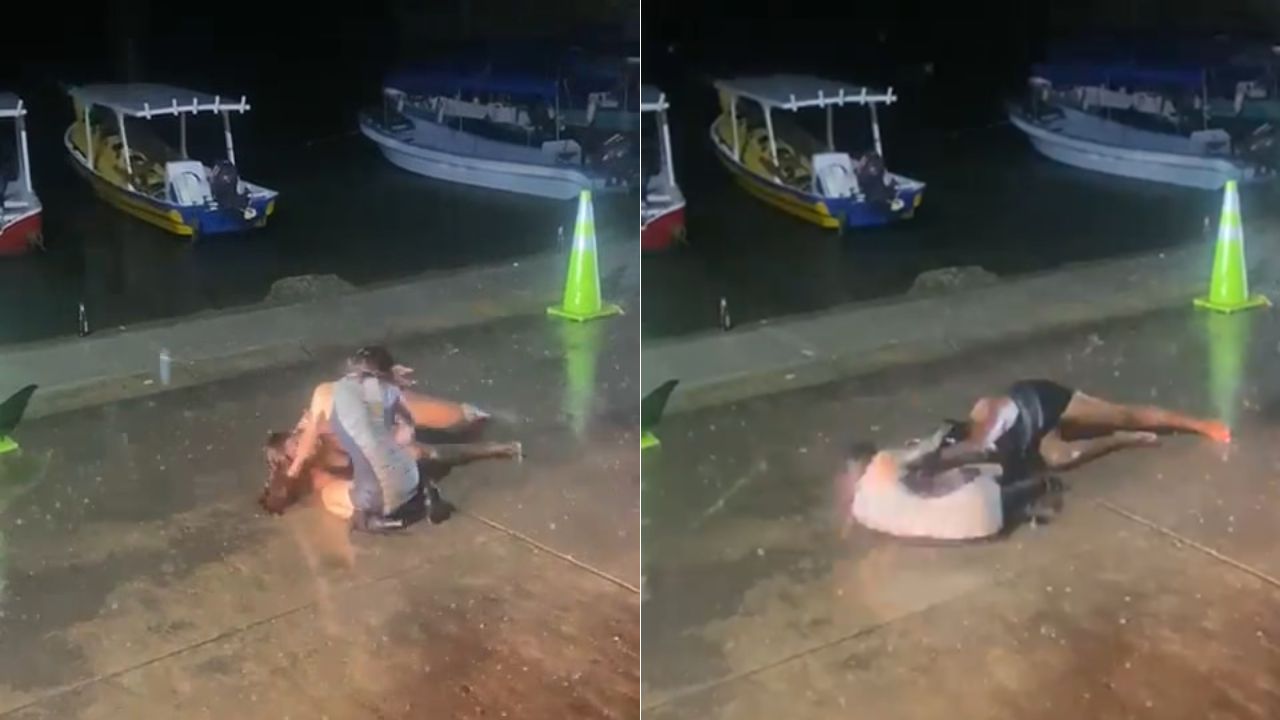 Mujeres protagonizan fuerte pelea bajo la lluvia en Islas de la Bahía