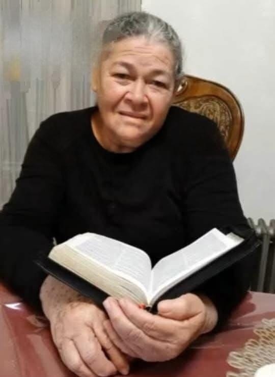 Una foto de la mujer