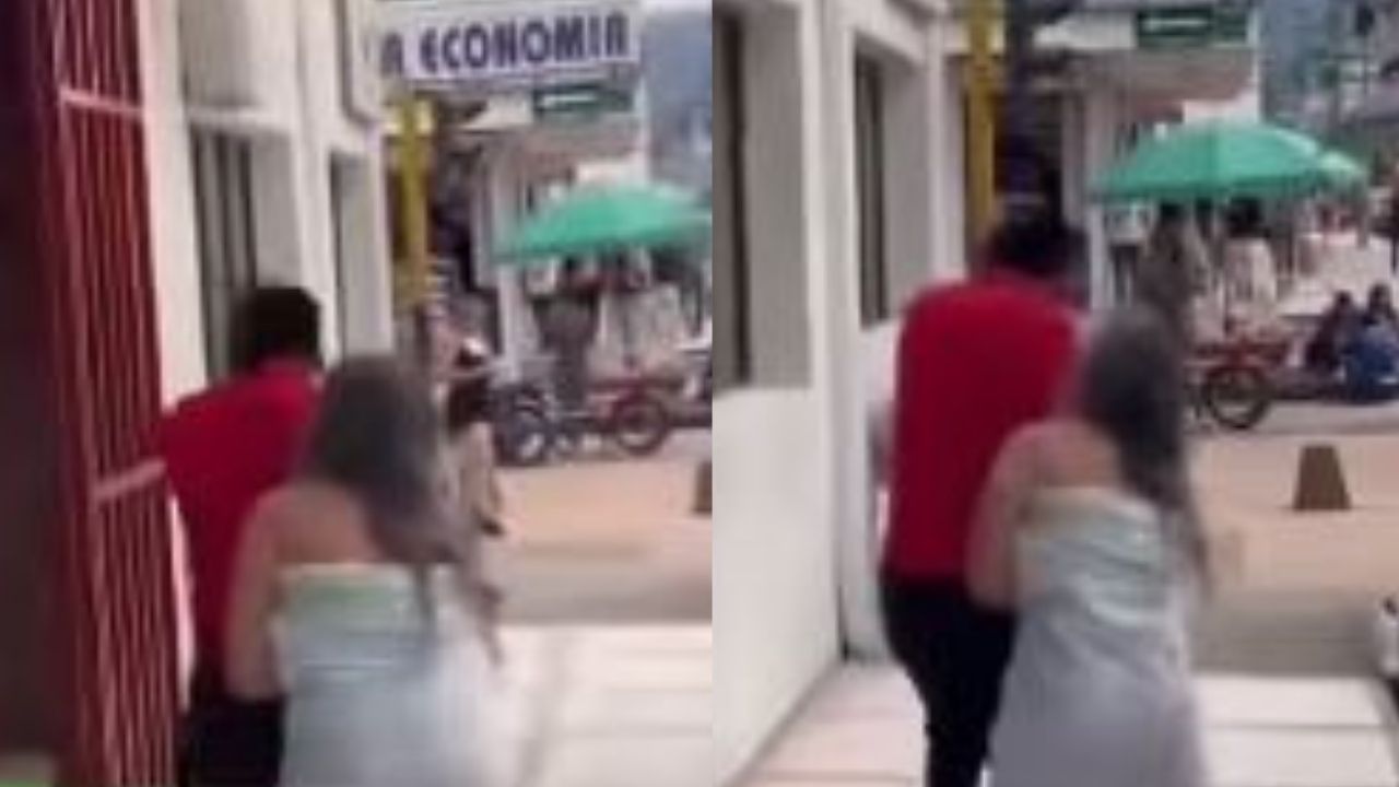 VIDEO: 'Yo lo amo', mujer en sábana persigue a su esposo tras ser sorprendida en hotel
